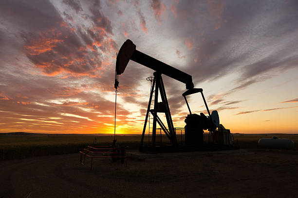 istock Oil Well Sunset Close up 184387593