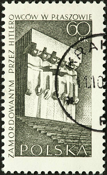 istock large stone monument with downcast figures on a Polish stamp 184387884