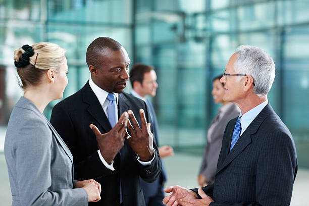 istock Business man expressing his views with executives 184387958