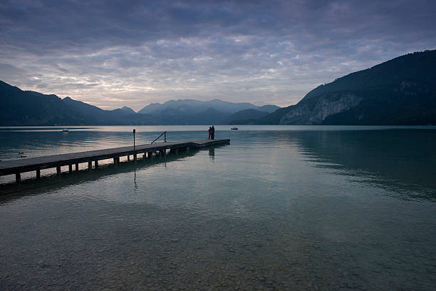 istock Couple standing on a jetty 184388262