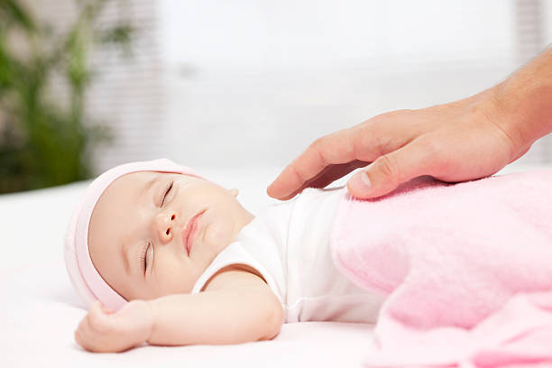 istock Taking care of baby. 184388524