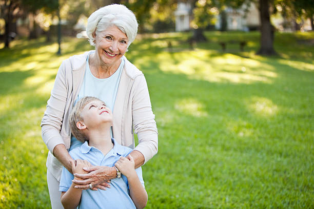 istock Grandmother hugging grandson 184388637
