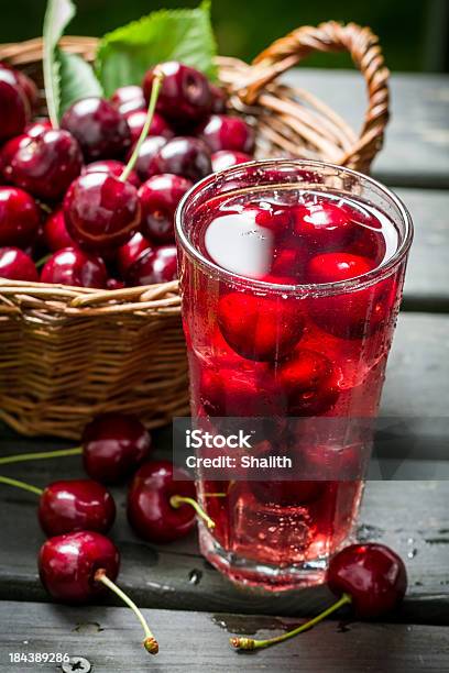 Fresh Juice Made Of Sweet Cherries And Ice Stock Photo - Download Image Now - Berry Fruit, Cherry, Close-up