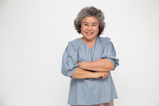 Portrait of Asian senior or old woman smile isolated over white background