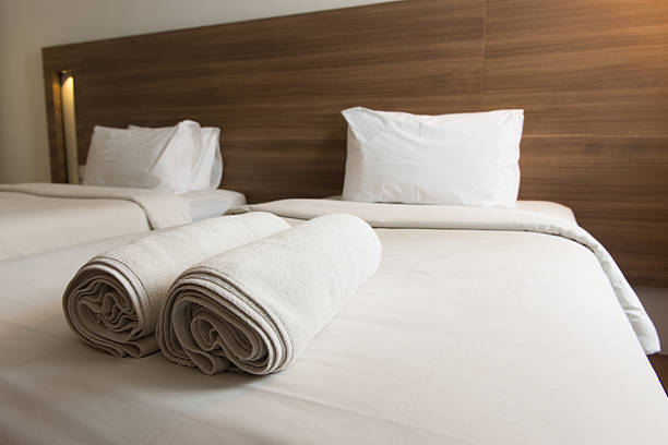 istock Close-up of a hotel bed with towels 184391261