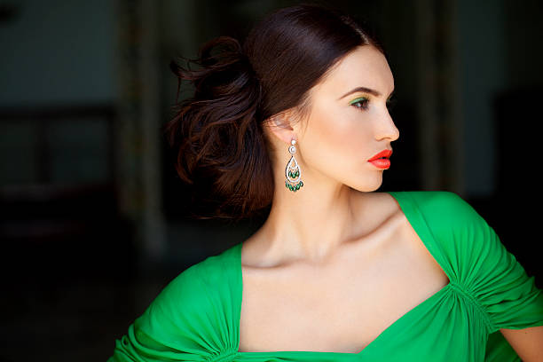 istock Profile a beautiful girl with earrings 184391782