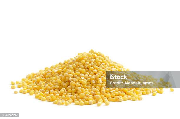 A Pile Of The Food Millet On A White Background Stock Photo - Download Image Now - Millet, Seed, White Background