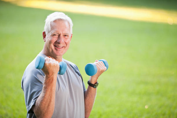 istock Senior man exercising outdoors 184392259