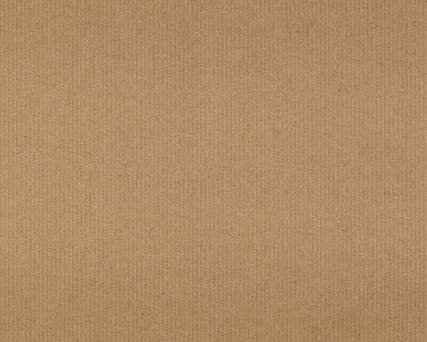 recycled cardboard This high resolution recycled paper stock photo is ideal for backgrounds, textures, prints, websites and many other "green" image uses! cardboard stock pictures, royalty-free photos & images