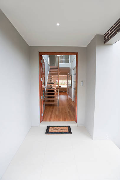 istock Welcome mat in front of an inviting house 184393224
