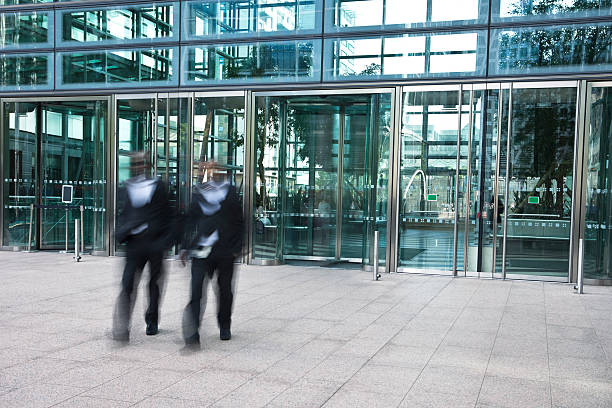 istock Two Afro-American Businessmen Walking in Financial District 184393417