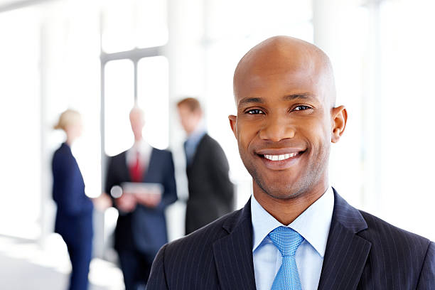 istock Young Businessman in an Office Lobby 184393552