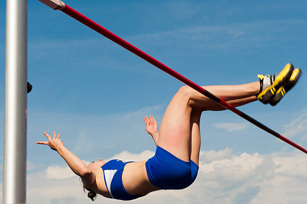 istock Young female athlete at high jump 184393604