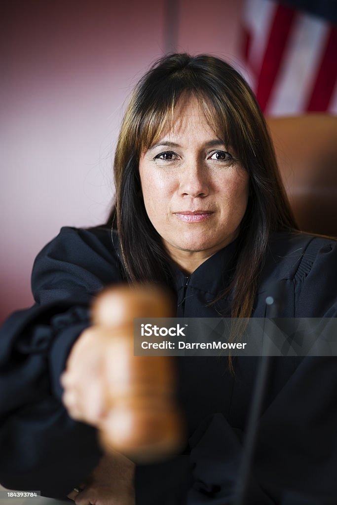 Judge Stock photo of a judge in her fourties sitting on the bench. 40-44 Years Stock Photo