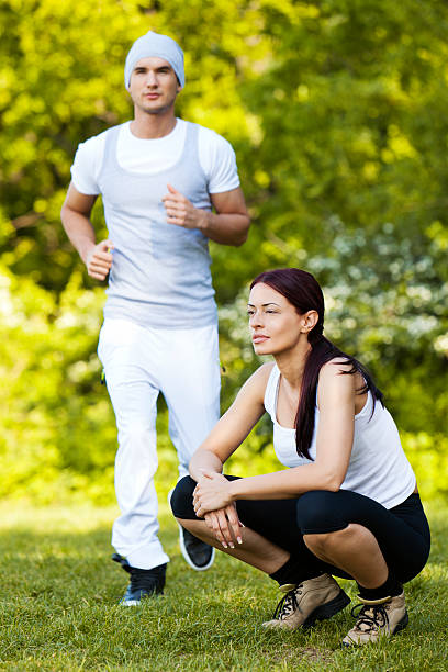 istock Couple Jogging Outdoors 184393812