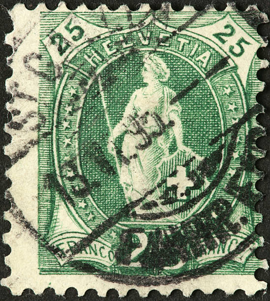 istock woman warrior on a very old Swiss postage stamp 184393868