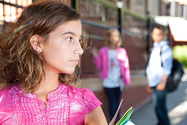 istock Teenage Student at School Looking to the Side 184393876