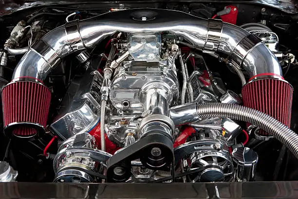 A hotrod engine with a supercharger and dual air intakes