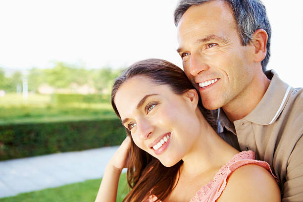 istock Relaxed couple in park 184394700