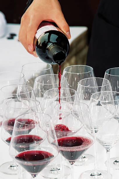 istock bottle of vine and glasses 184394702