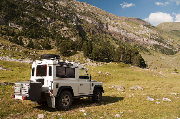 4x4 Jeep parked on the side of the mountain in spring.