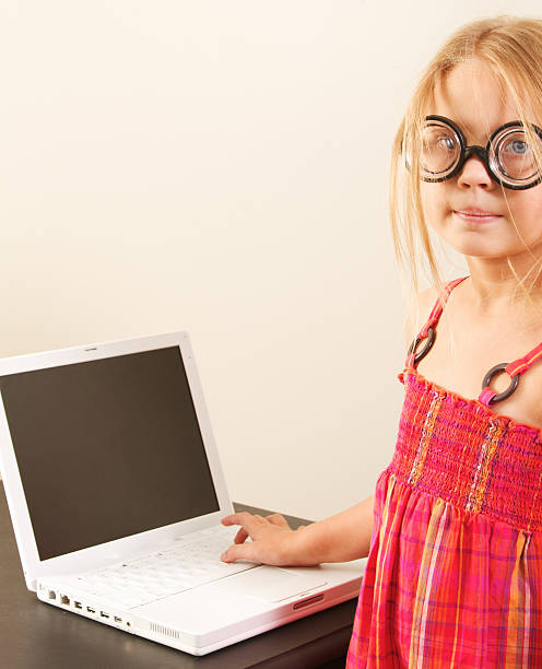 маленький nerdy girl in glasses - child cross eyed nerd eyewear стоковые фото и изображения