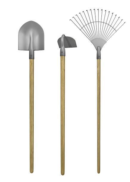 A few gardening tools on a white background Garden tools isolated on a white background. garden hoe photos stock pictures, royalty-free photos & images