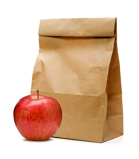 marrón, bolsa de papel y manzana - packed lunch paper bag apple lunch fotografías e imágenes de stock