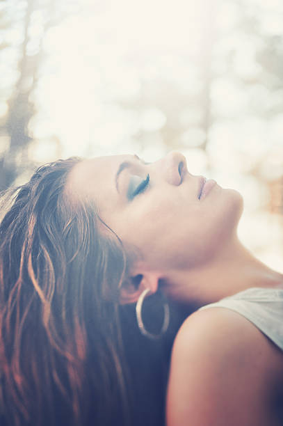 istock Beautiful woman in sunlight 184396828