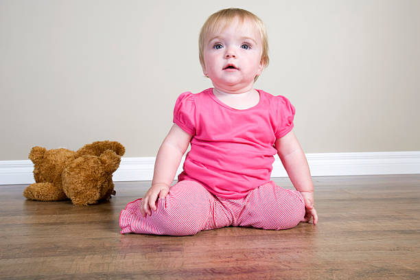 istock Baby On The Floor 184397245