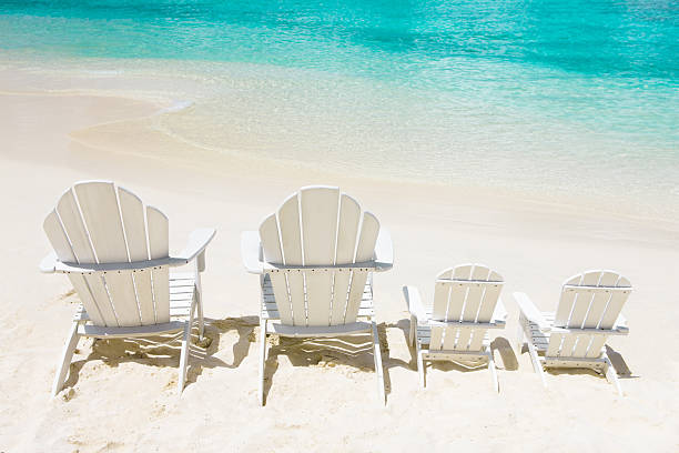 istock empty chairs for family on vacation at the Caribbean beach 184397287