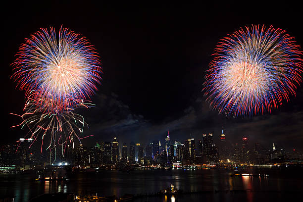 New York City Syncronized Fireworks July 4th on the Hudson River in front of ManhattanClick Here to view my other Cityscapes and Architecture: new years eve new york stock pictures, royalty-free photos & images