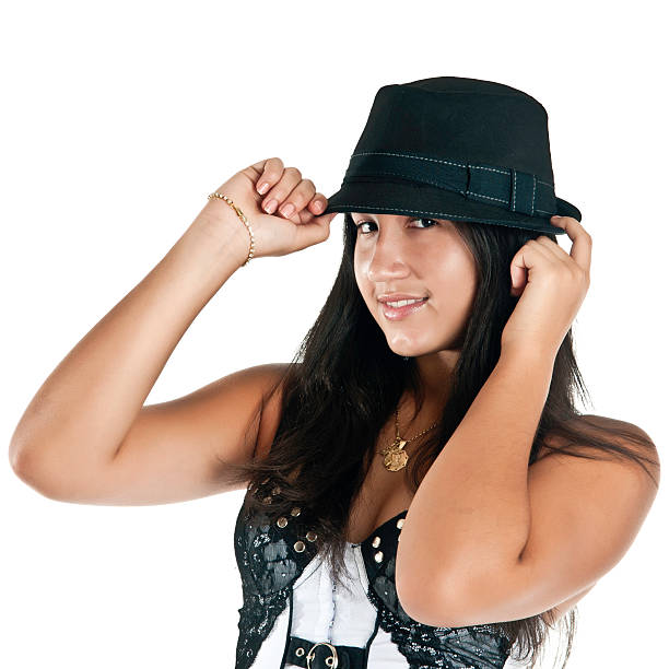 Beautiful hispanic teen with black hat