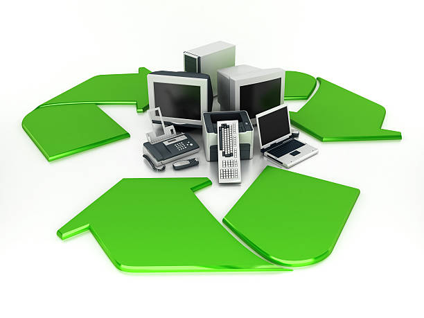 Old electronics recycling Old computers parts and electronics standing at the center of recycling symbol.Similar images: recycling computer electrical equipment obsolete stock pictures, royalty-free photos & images