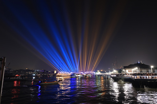 Light and firework show over the old steel bride ,Phra Phuttha Yodfa Bridge at Bangkok, Thailand Theme Vijit Chao Phraya 2023 Bangkok Thailand