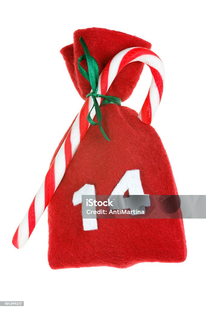 red Christmas bag for advent calendar isolated on white red Christmas bag for advent calendar isolated on white day 14 Christmas Stock Photo