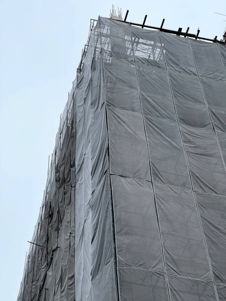 istock scaffolding and work on the building site 1843993069