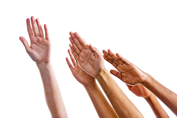 istock Five mixed hands reaching upward and to the left 184399433