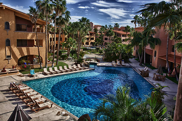 istock Swimming Pool Scene at Tropical Resort 184400349