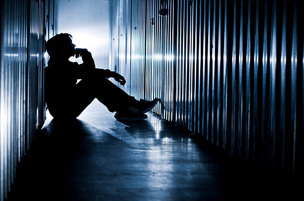 Prison Please see some similar images from my portfolio: silhouette of depressing stock pictures, royalty-free photos & images