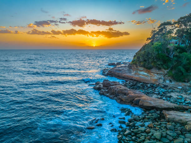 istock Sunrise Rocks at the Seaside 1844018617