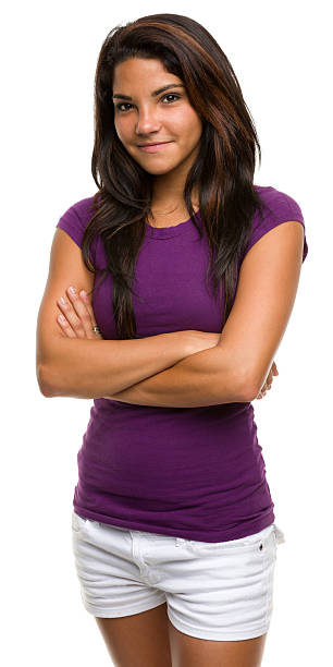 Woman dressed in a purple top smiling at the camera