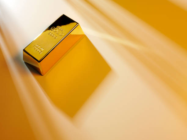 istock Paper and Gold Bullion 184403915