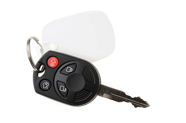Automotive Remote Key on White Automotive remote key on white key ring photos stock pictures, royalty-free photos & images