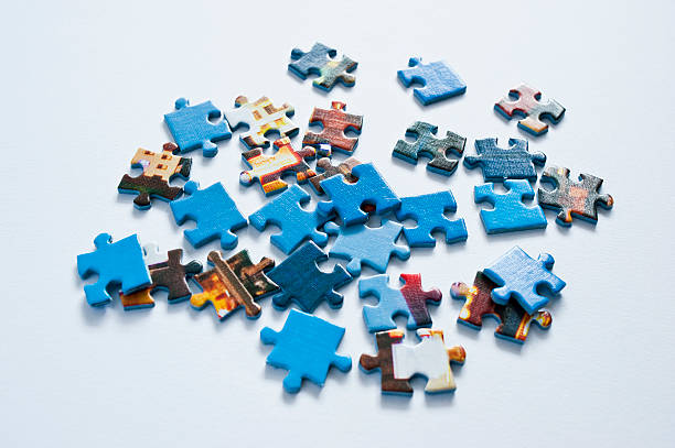 Messy pieces of jigsaw puzzle.