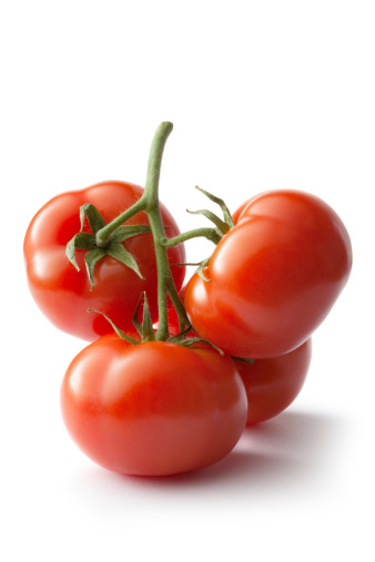 Many different ripe tomatoes on white background, flat lay