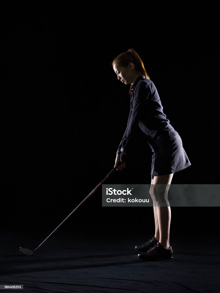 Silueta de mujer jugando al golf - Foto de stock de Musculoso libre de derechos