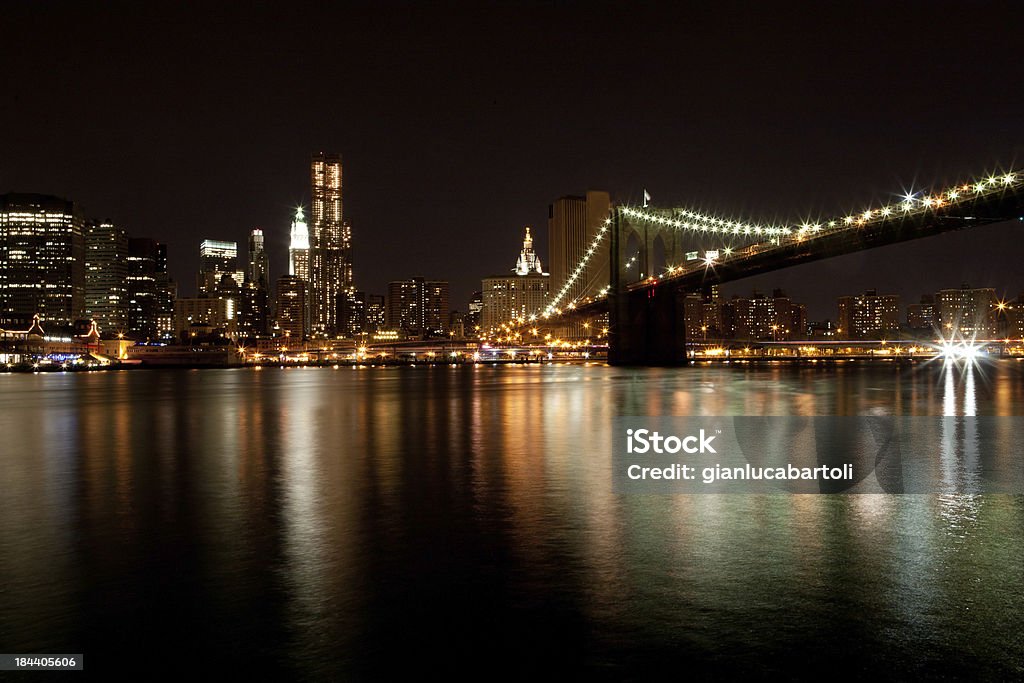 Brooklyn bridge by night Brooklyn bridge an manhattan by nightMore like this Blurred Motion Stock Photo