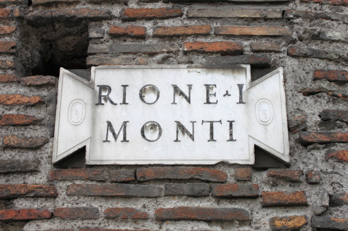 Old district plate in the downtown of Rome, Italy