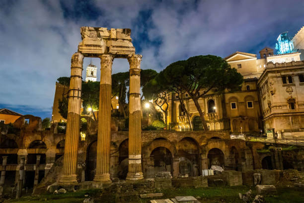 istock Scenic night view of Roman Forum site illuminated columns 1844064350